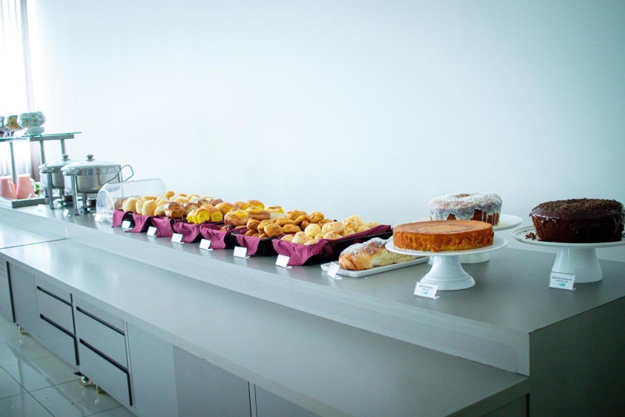 Hotel H2 Congonhas Екстериор снимка A selection of cakes